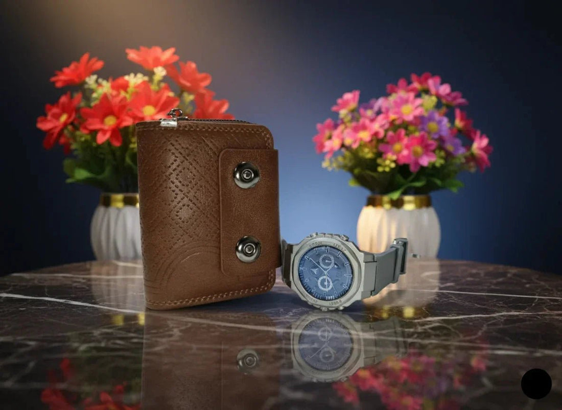 Brown leather wallet and silver watch on a reflective surface with flowers in the background