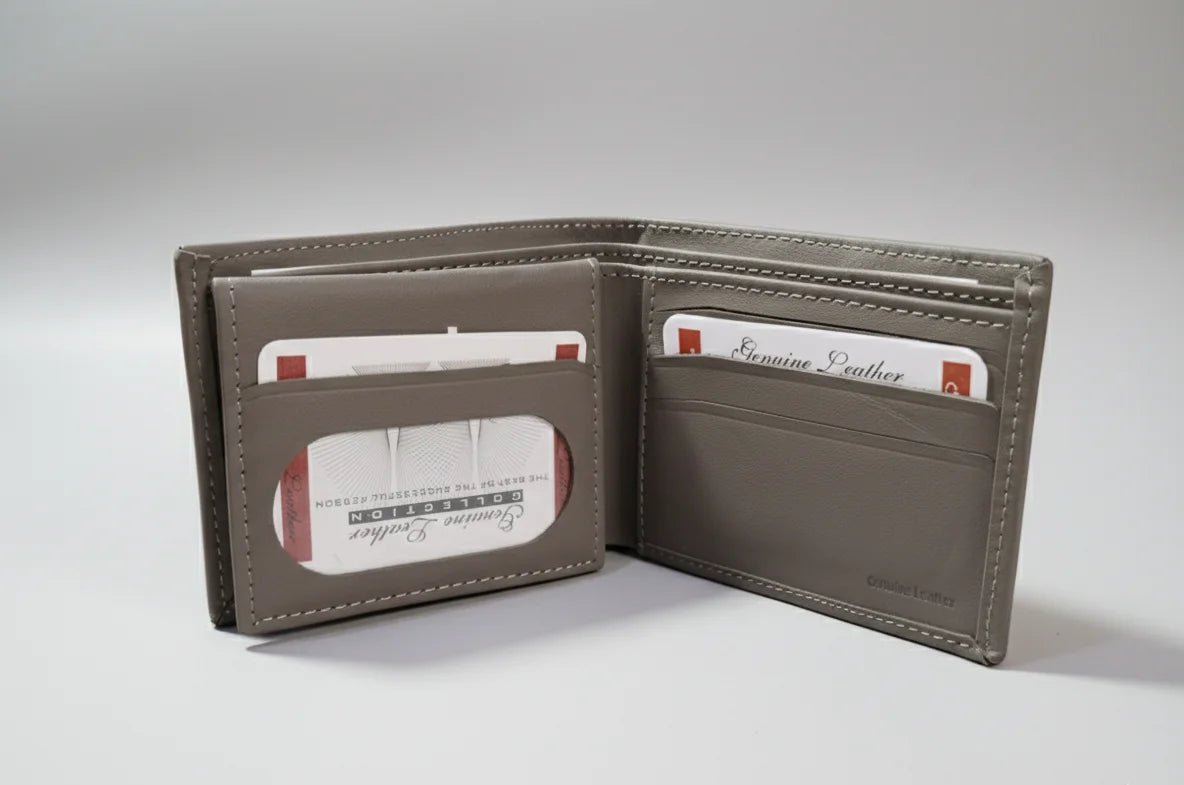 Open brown leather wallet with card slots on a gray background