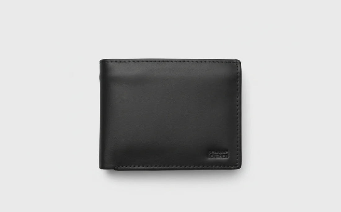 Four leather wallets in black, gray, beige, and brown on a light gray background.