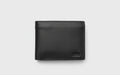 Black leather wallet on a light gray background