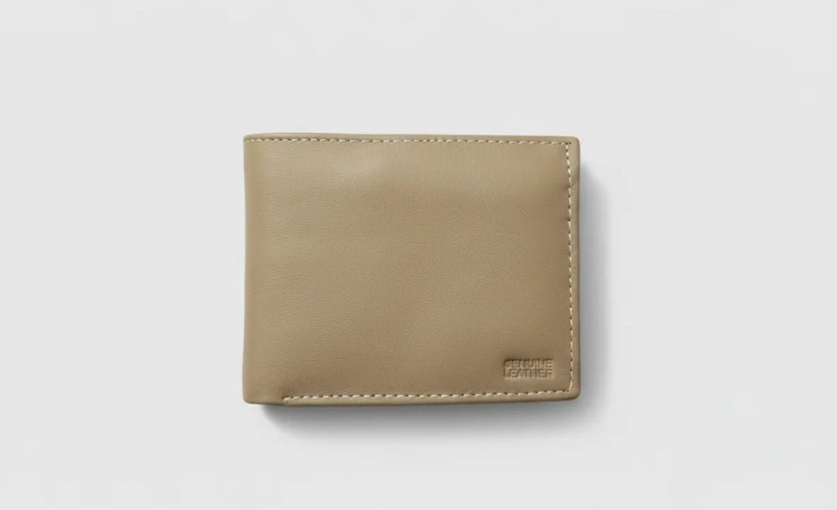 Beige leather wallet on a light gray background