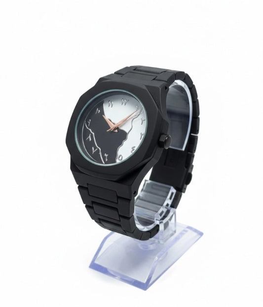 Black wristwatch on a clear stand against a white background