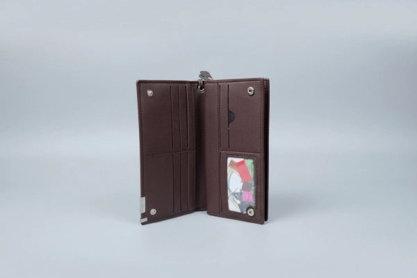 Brown leather wallet open on a light gray background