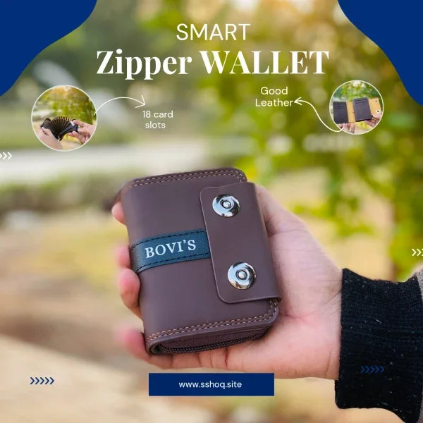 Hand holding a brown smart zipper wallet with Bovi's branding, against a blurred natural background.