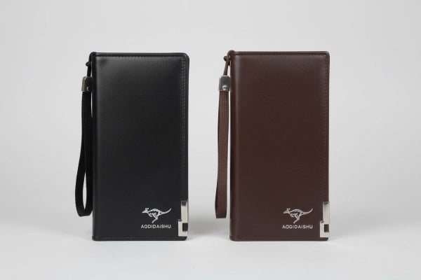 Black and brown leather wallets with 'Kodama' branding on a white background