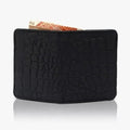 Black textured wallet with a card partially pulled out on a white background